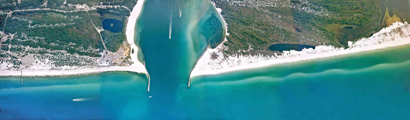 The Channel Entrance is where the dolphin swim tours take place. Dolphin swim tours Panama City, Florida.