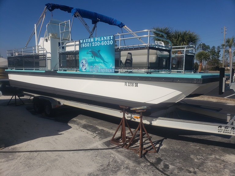 One of our dolphin swim boats getting maintenance for the new season.